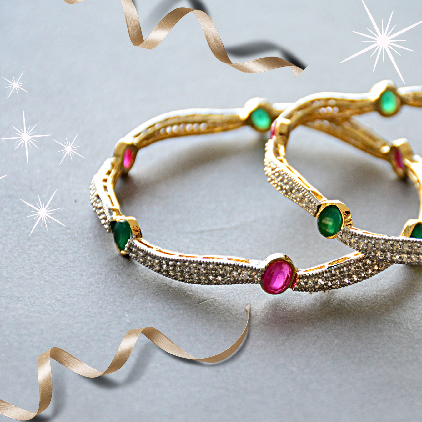 Festive bangles with pink and green jewels