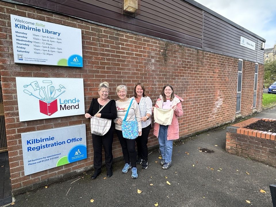 Residents use sewing machines at Lend and Mend hub Kilbirnie Library to make their own tote bas with Creative Recycling Ltd