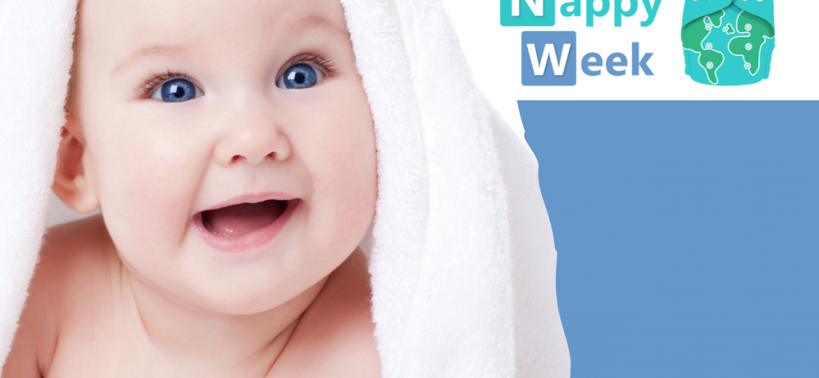 Baby smiling with towel and Reusable Nappy Week logo