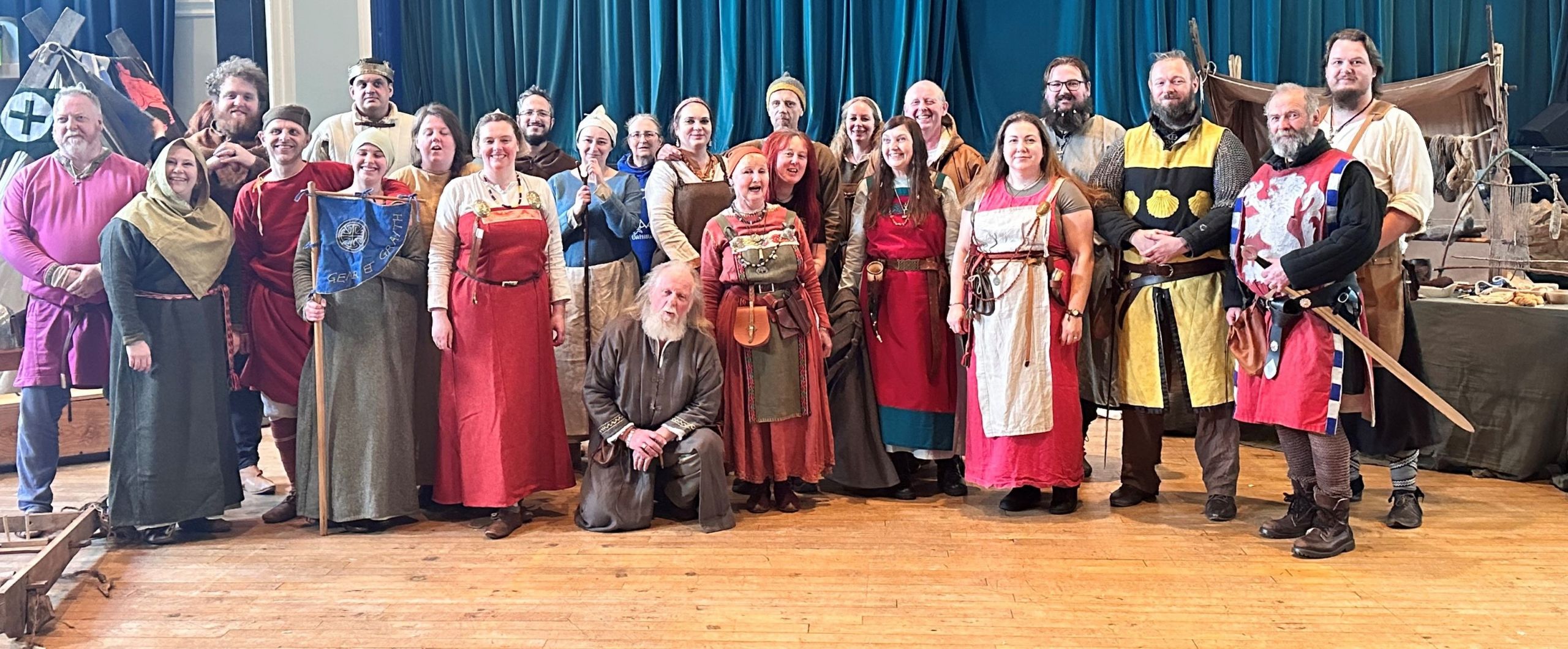 Vikingar reenactment group photo in viking costumes