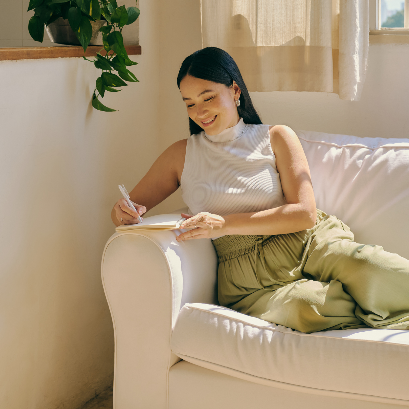 Woman writing taking time for mindfulness