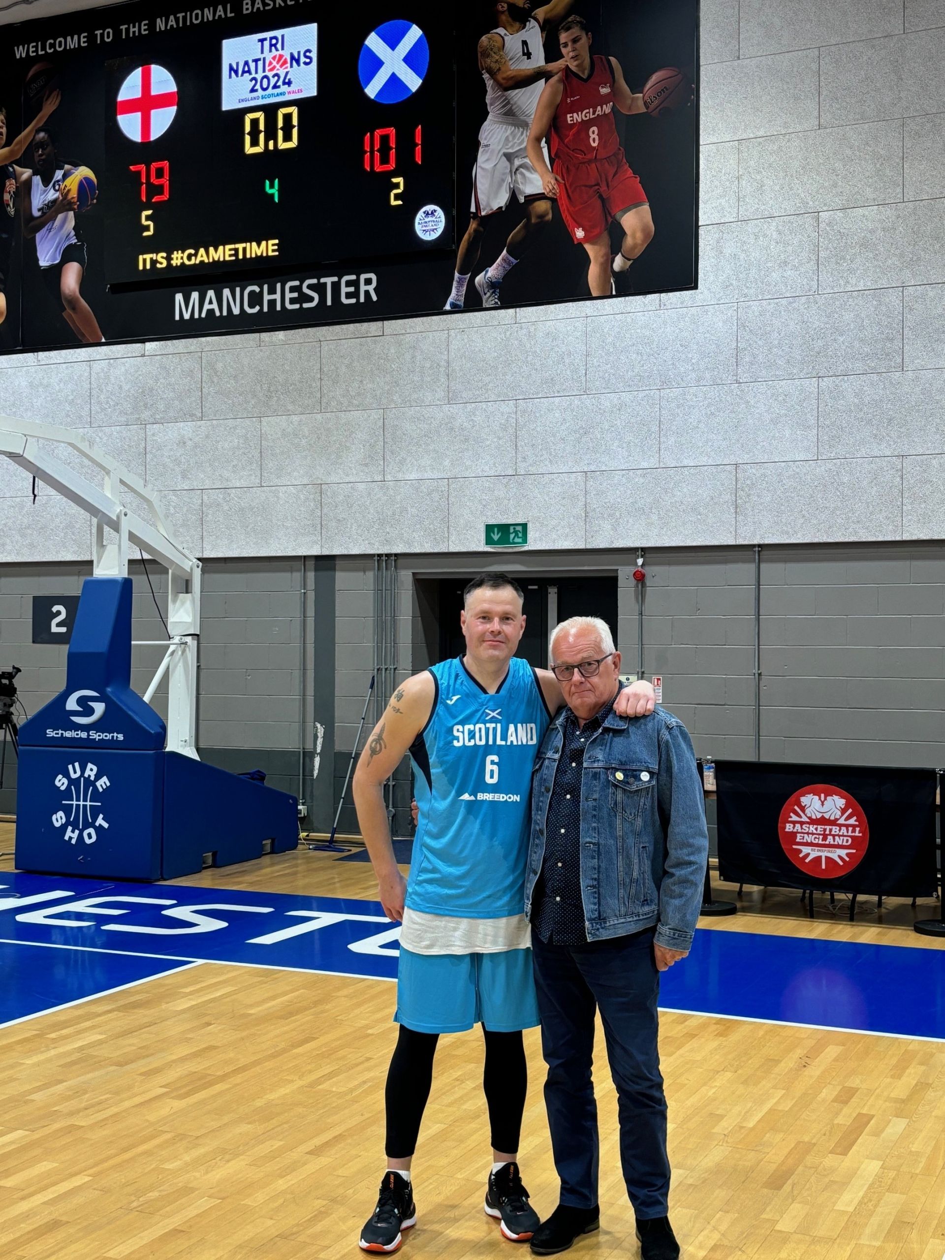 Graham Hunter from CLD with his dad on basketball court