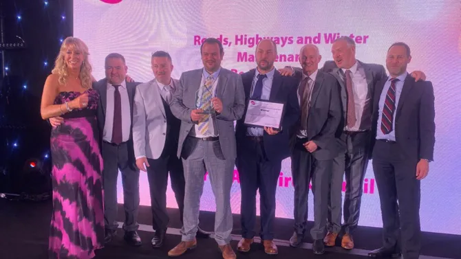 The Roads team on stage collecting their award at the APSE prizegiving