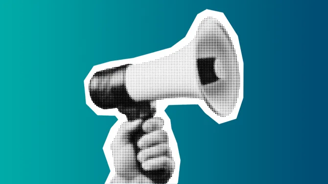 Hand holding a megaphone